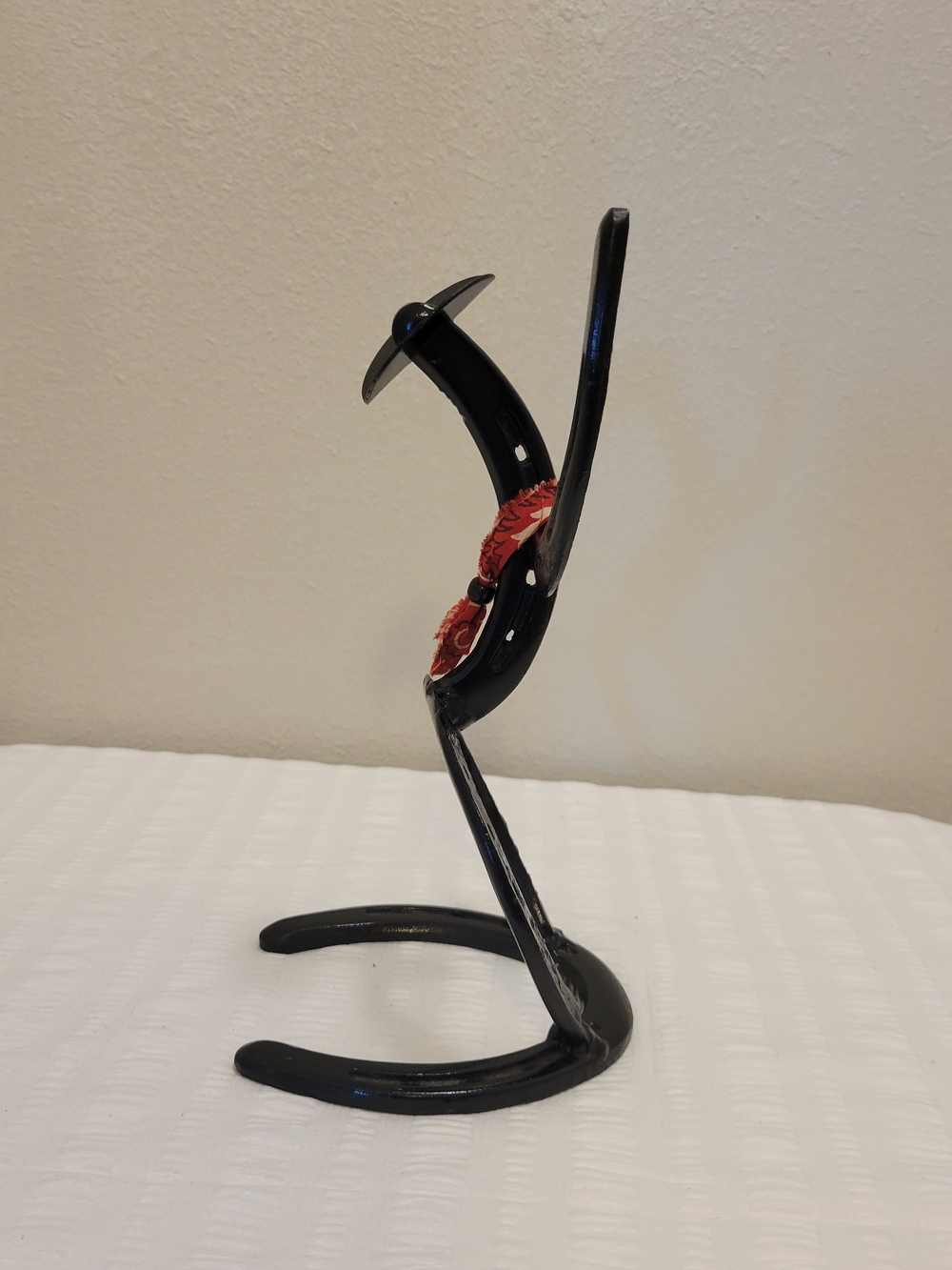 Black Metal Horseshoe Dancing Figurine with Red Accents - Home Art